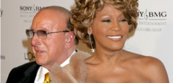 Officer sues over Whitney Houston fallout